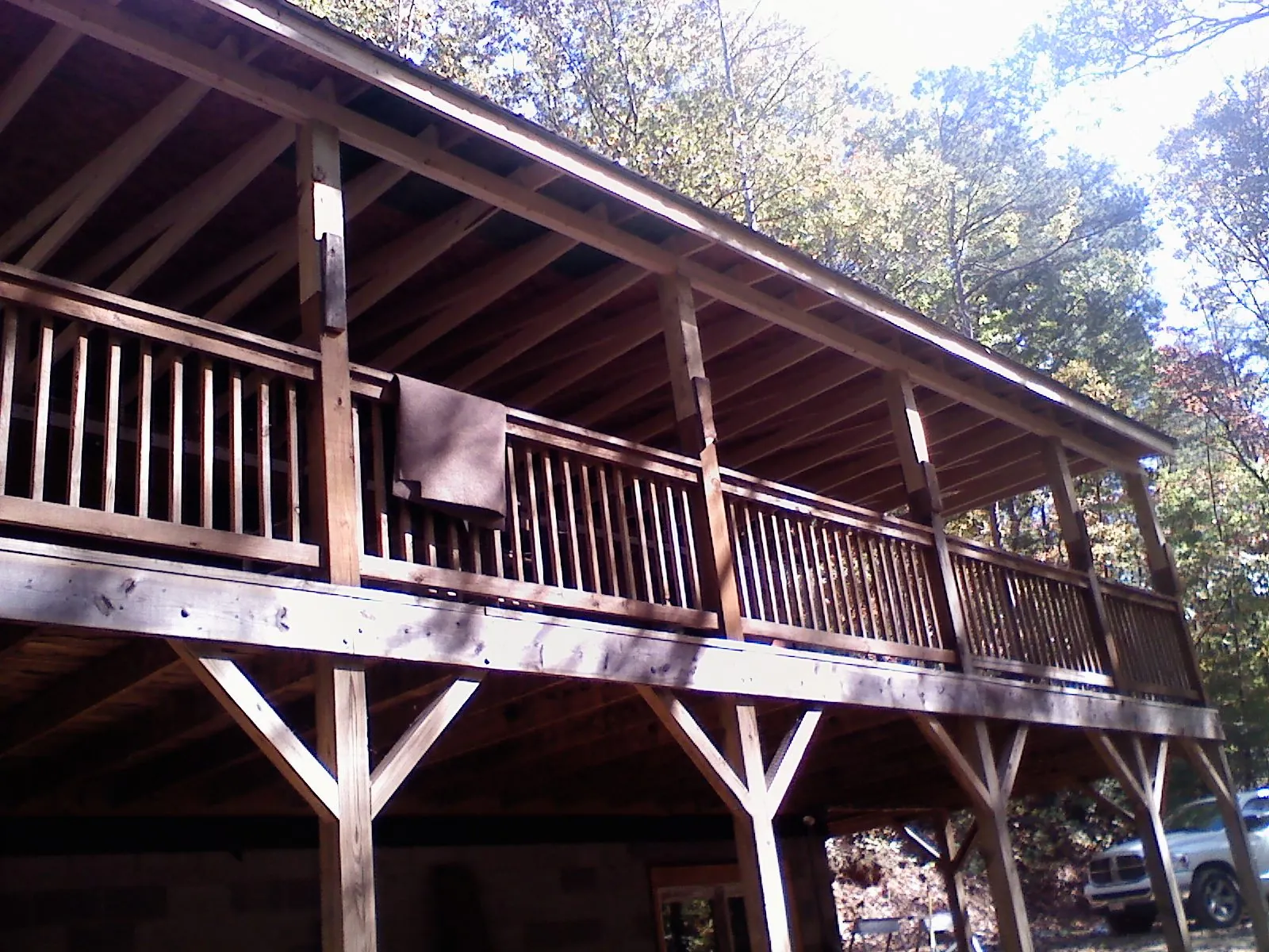 Timber framing under a new elevated porch and deck — Roof Leak Repair in Amityville by Roofing Brothers